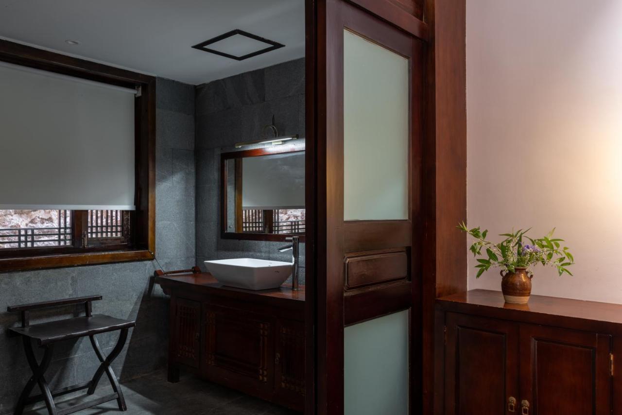 Jun Bo Xuan Boutique Hotel Licsiang Kültér fotó