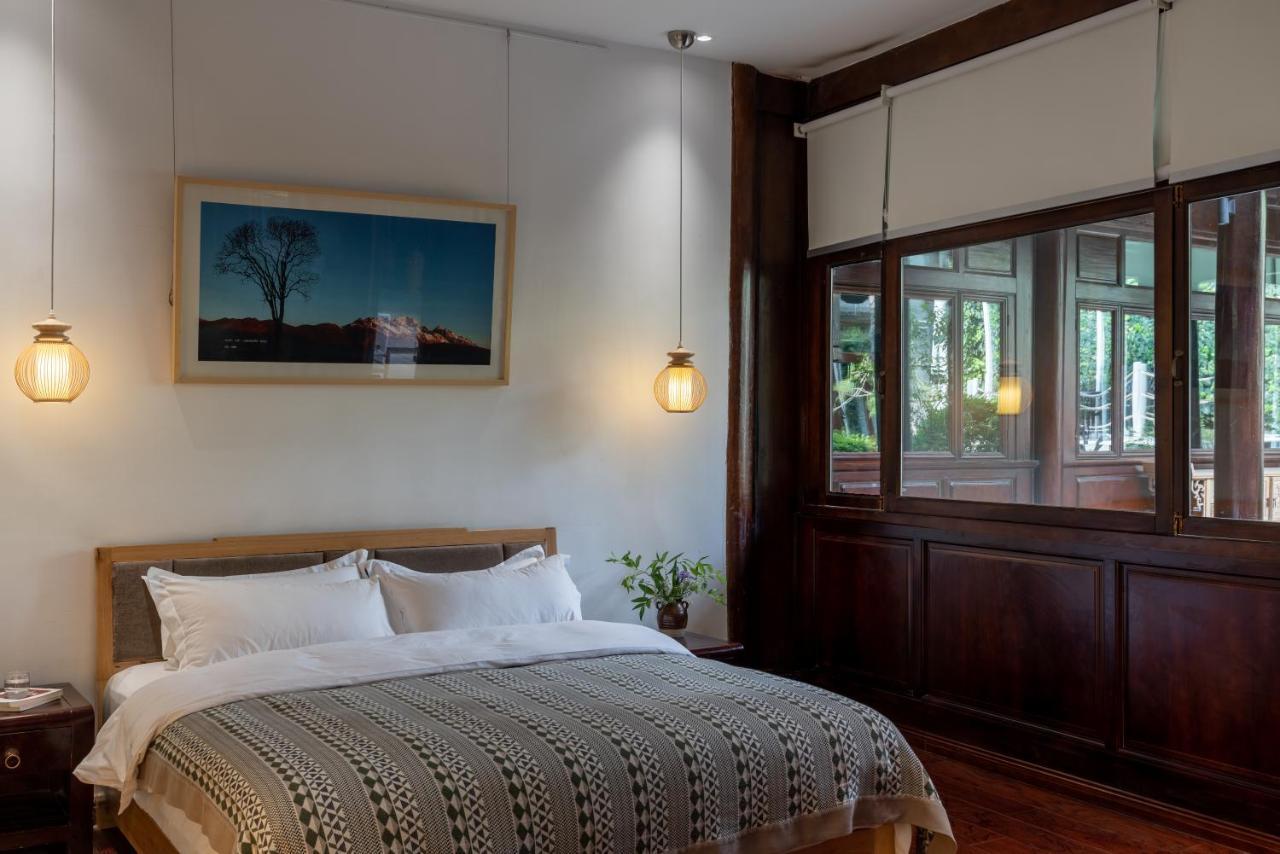 Jun Bo Xuan Boutique Hotel Licsiang Kültér fotó