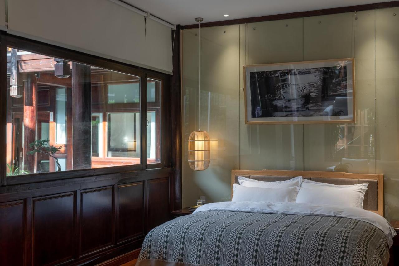Jun Bo Xuan Boutique Hotel Licsiang Kültér fotó