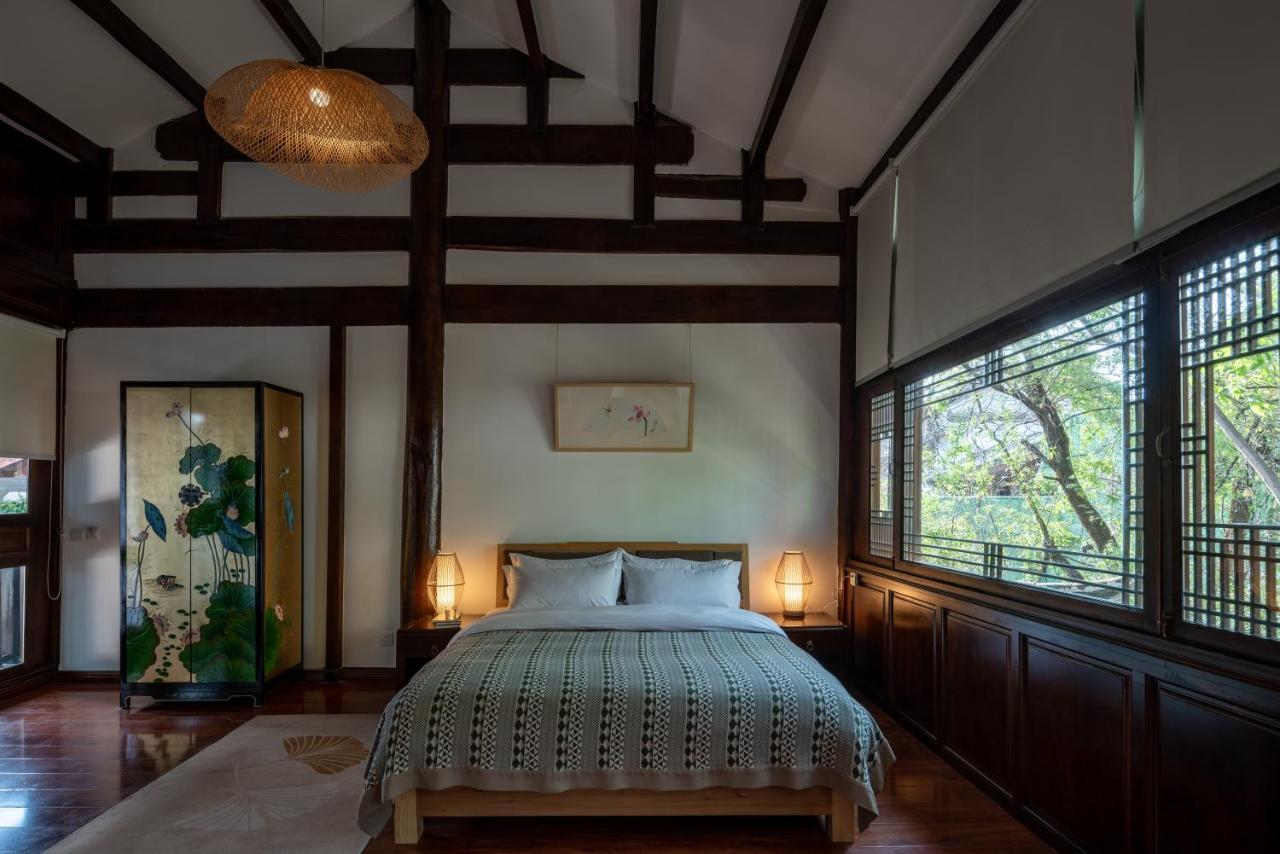 Jun Bo Xuan Boutique Hotel Licsiang Kültér fotó