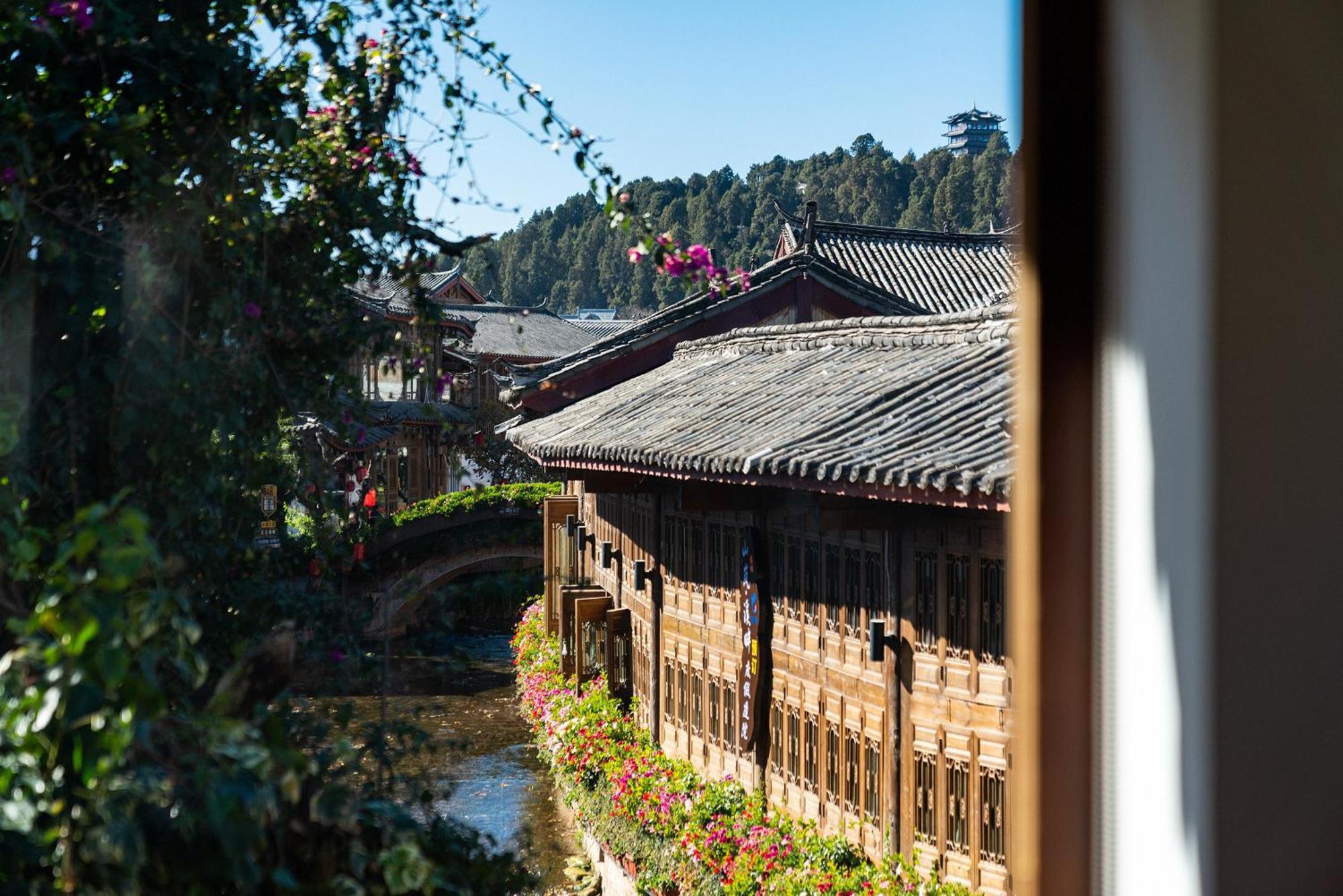 Jun Bo Xuan Boutique Hotel Licsiang Kültér fotó